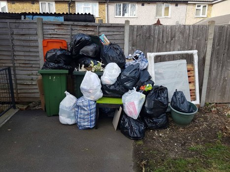 Flat clearance team removing furniture from a Hornsey flat